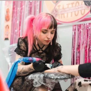 Vanessa - The Black Hat Tattoo