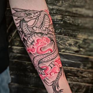 Dragon Tattoo and Flowers - Arm - Black Hat Tattoo Dublin - The Black Hat Tattoo