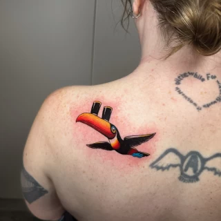 Guinness Toucan - Irish & Celtic Tattoo - Black Hat Tattoo Dublin - The Black Hat Tattoo