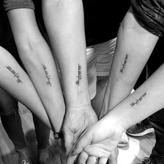 Ogham group tattoo - Script Quote Tattoo - Black Hat Tattoo Dublin - The Black Hat Tattoo