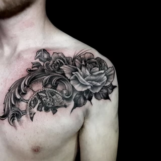 Roses on chest - - Rose Tattoo - Black Hat Tattoo Dublin - The Black Hat Tattoo