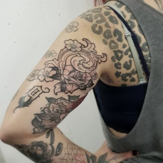 Neotrad and filigree rose on arm - Rose Tattoo - Black Hat Tattoo Dublin - The Black Hat Tattoo
