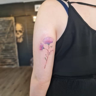 Flower on arm - Tattoo for girls - Black Hat Tattoo Dublin - The Black Hat Tattoo