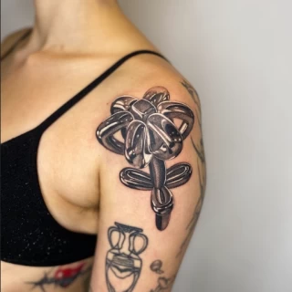 batu flower - The Black Hat Tattoo