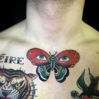 Old School Butterfly Tattoo on chest  - Black Hat Tattoo Dublin - The Black Hat Tattoo
